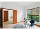 Bright home office featuring a window and a chair at the desk with decor at 4646 Rocky Knob Ln, Indianapolis, IN 46254
