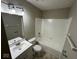 Bathroom with shower/tub combo and vanity at 5209 Laredo St, Indianapolis, IN 46237