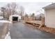 Backyard with wooden deck and detached garage at 6004 S Orinoco Ave, Indianapolis, IN 46227