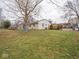 Landscaped backyard with playset at 6004 S Orinoco Ave, Indianapolis, IN 46227