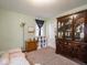 Cozy bedroom with wood flooring and built-in shelving at 6004 S Orinoco Ave, Indianapolis, IN 46227