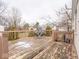 Wooden deck with chairs and a small table at 6004 S Orinoco Ave, Indianapolis, IN 46227