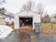 Detached single-car garage with storage items at 6004 S Orinoco Ave, Indianapolis, IN 46227