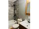 Updated bathroom with tile shower and vanity at 6107 Hazelhatch Dr, Indianapolis, IN 46228
