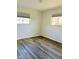 Simple bedroom with hardwood floors and neutral walls at 6107 Hazelhatch Dr, Indianapolis, IN 46228