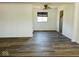 Bright dining room featuring hardwood floors and a ceiling fan at 6107 Hazelhatch Dr, Indianapolis, IN 46228