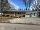 Brick ranch home with attached garage and landscaped yard at 6107 Hazelhatch Dr, Indianapolis, IN 46228