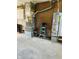 Unfinished garage with furnace and water heater at 6107 Hazelhatch Dr, Indianapolis, IN 46228