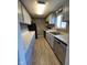 Renovated kitchen, featuring updated cabinetry and appliances at 6107 Hazelhatch Dr, Indianapolis, IN 46228