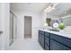 Modern bathroom with double vanity, large shower, and ample storage at 6345 Stone Side Dr, Plainfield, IN 46168