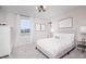 Charming bedroom with a soft pink color scheme, featuring a queen-size bed and a large window at 6345 Stone Side Dr, Plainfield, IN 46168