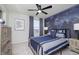 Stylish bedroom with a world map accent wall, a comfortable bed, and plenty of storage at 6345 Stone Side Dr, Plainfield, IN 46168