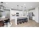 Modern kitchen with white cabinets, stainless steel appliances, and an island at 6345 Stone Side Dr, Plainfield, IN 46168