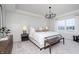 Spacious main bedroom with large bed, ample natural light, and stylish decor at 6345 Stone Side Dr, Plainfield, IN 46168