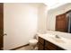 Bathroom featuring a single sink vanity with a standard toilet at 8041 Halyard Way, Indianapolis, IN 46236