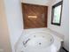 Bathroom with a soaking tub at 8041 Halyard Way, Indianapolis, IN 46236