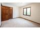 Cozy bedroom with natural light and carpeted flooring, creating a welcoming atmosphere at 8041 Halyard Way, Indianapolis, IN 46236