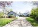 Charming single Gathering home with an attached two-car garage and a well-manicured front yard at 8041 Halyard Way, Indianapolis, IN 46236