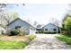 Charming single Gathering home with an attached two-car garage and a well-manicured front yard at 8041 Halyard Way, Indianapolis, IN 46236