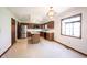 Eat-in kitchen features stainless steel appliances and center island at 8041 Halyard Way, Indianapolis, IN 46236