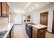 Well-lit kitchen with modern appliances and eat-in space at 8041 Halyard Way, Indianapolis, IN 46236
