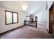 Open-concept living room with stone fireplace and natural light at 8041 Halyard Way, Indianapolis, IN 46236