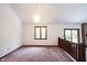 Bright living room featuring large windows, slider, and decorative lighting at 8041 Halyard Way, Indianapolis, IN 46236