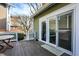 Backyard features a wood deck with glass sliding doors at 8072 Foxchase Dr, Indianapolis, IN 46256