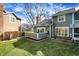 A backyard includes a small patio area and view of neighboring homes at 8072 Foxchase Dr, Indianapolis, IN 46256