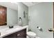 Simple bathroom features a vanity with a cream countertop and a standard white toilet at 8072 Foxchase Dr, Indianapolis, IN 46256