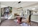 Dining area features wood floors and access to the kitchen and living room at 8072 Foxchase Dr, Indianapolis, IN 46256