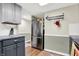 Kitchen featuring stainless steel refrigerator, granite countertops and gray cabinets at 8072 Foxchase Dr, Indianapolis, IN 46256