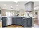 Kitchen with gray cabinets, stainless steel appliances, and granite countertops at 8072 Foxchase Dr, Indianapolis, IN 46256