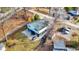Two-story white house with dark accents and patio at 8598 S Riser Dr, Nineveh, IN 46164