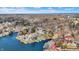 Aerial view showcasing lakefront homes and surrounding landscape at 8598 S Riser Dr, Nineveh, IN 46164