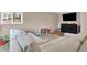Finished basement with sectional sofa and play area at 8598 S Riser Dr, Nineveh, IN 46164