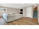 Finished basement with sectional sofa and wood floors at 8598 S Riser Dr, Nineveh, IN 46164