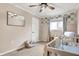 Bedroom with crib, window, and neutral color scheme at 8598 S Riser Dr, Nineveh, IN 46164