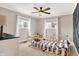 bedroom with crib, dresser, and playful decor at 8598 S Riser Dr, Nineveh, IN 46164