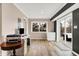 Bright home office with wood floors and exterior access at 8598 S Riser Dr, Nineveh, IN 46164