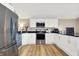 Modern kitchen with stainless steel appliances and granite countertops at 8598 S Riser Dr, Nineveh, IN 46164