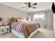 Spacious main bedroom with carpeted floor, ceiling fan and large window at 8598 S Riser Dr, Nineveh, IN 46164