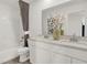 Bright bathroom featuring double vanity, neutral finishes, and a combined shower and tub at 8885 Lowell St, McCordsville, IN 46055