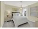 Inviting bedroom with a large window, stylish decor, and comfortable, bright bedding at 8885 Lowell St, McCordsville, IN 46055