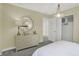 Bright bedroom features a large mirror above a dresser and a walk-in closet with ample storage at 8885 Lowell St, McCordsville, IN 46055