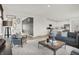 Bright living room offering open concept with modern design and decor at 8885 Lowell St, McCordsville, IN 46055