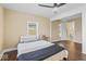 Comfortable bedroom with hardwood floors and en suite bath at 916 N Bradley Ave, Indianapolis, IN 46201