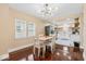 Bright dining area adjacent to the kitchen, featuring hardwood floors and natural light at 916 N Bradley Ave, Indianapolis, IN 46201