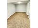 Spacious basement area with neutral walls and carpet at 9508 Conried Dr, Indianapolis, IN 46235