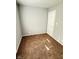 Spacious bedroom with neutral walls and brown carpet at 9508 Conried Dr, Indianapolis, IN 46235